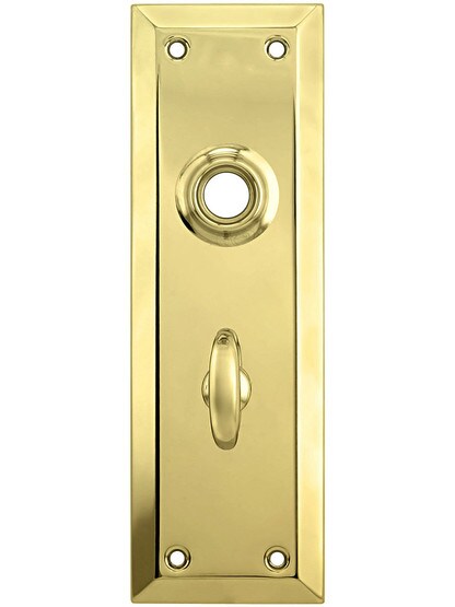 Stamped Brass New York Back Plate With Thumb Turn in Unlacquered Brass.
